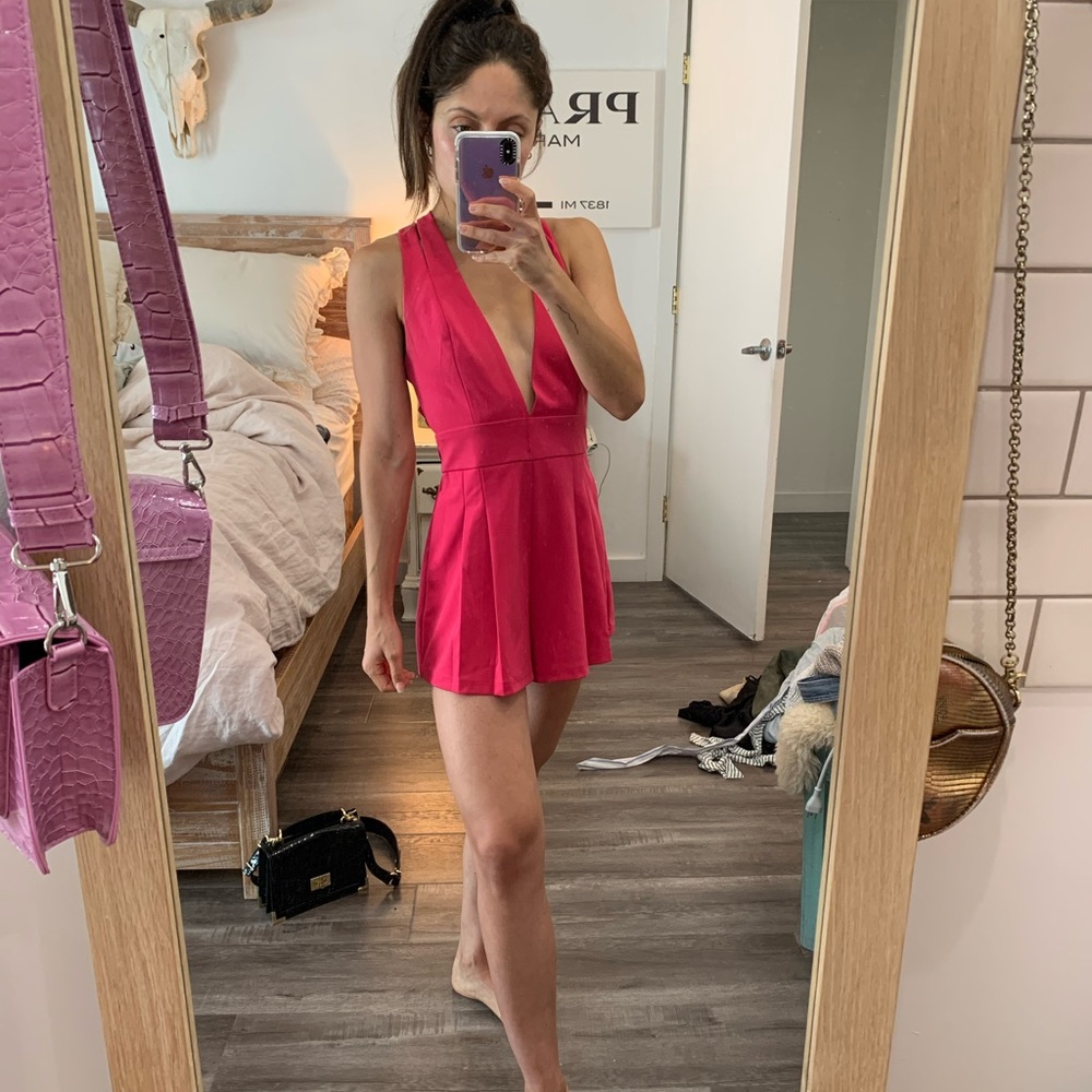 NBD hot pink romper with cross in the back